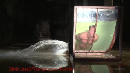 Body Builder Faces The Water Chamber