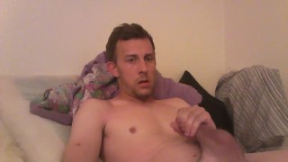 Young Fit Guy plays with his dick.