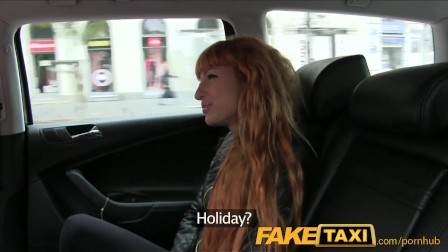 FakeTaxi Sexy redhead takes a pounding from behind