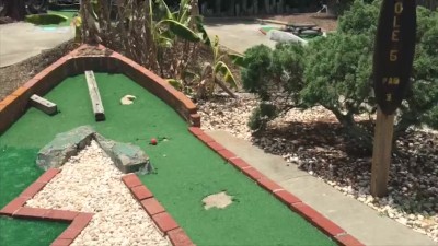 Public Exposed Hot blonde playing PUTT PUTT