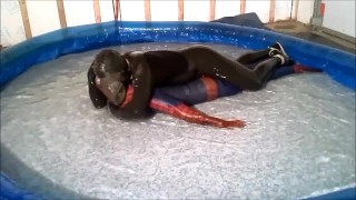 The Orca frogman has spiderman trapped in his jerkoff pool