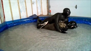 Wet gasmasked Orca frogman humps and struggles with another frogman