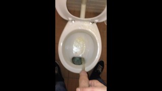 Taking a dirty piss in a public toilet