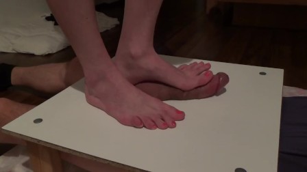 bare feet massaging big cock