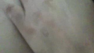 Young babe plays with wet pussy