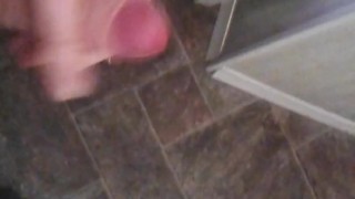 using my phone as i cum on the floor in public bathroom