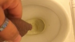 Me peeing into toilet