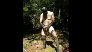 jerking off outside in stockings, long gloves and gasmask