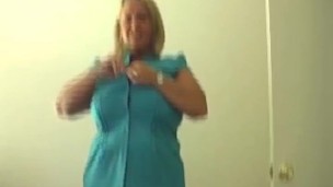Blonde lady with big tits jerks off a cock