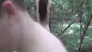 Fisting his GF tied to a public forest tree