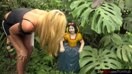 Attractive blonde shemale strips outdoors and shows huge ass