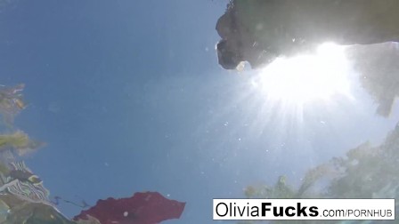 Olivia Austin has some summer fun in the pool