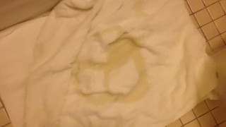 Pissing circles on a towel