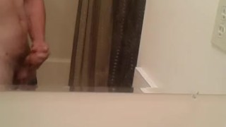 Masturbating