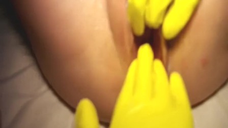 Fisting and fucking her teen pussy with a rubber boot