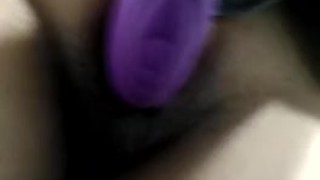 Masturbating