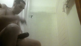 POV - Guy is playing with his flashlight in the shower