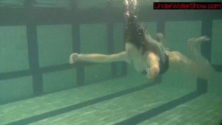 ebonyhaired beauty Irina underwater