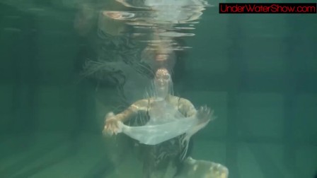 ebonyhaired beauty Irina underwater