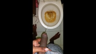 Black teen boy pissing