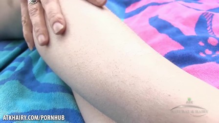 Natural hairy babe Trixie strips outside and plays with her pussy