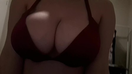 Revealing and playing with huge boobs