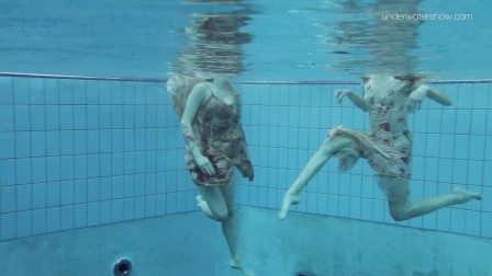 Two hot hairy beauties underwater
