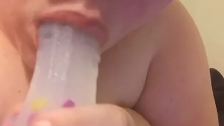 Watch this big girl swallow a cute dildo