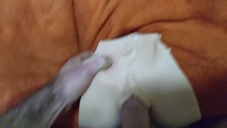Cum shot all over a fake pussy
