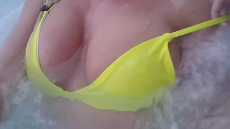 Playing with my boobs in hot tub