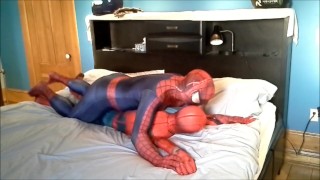 spiderman plays with his dummy spiderman