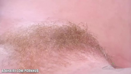 Thick red headed babe Lucy shows off her hairy pussy