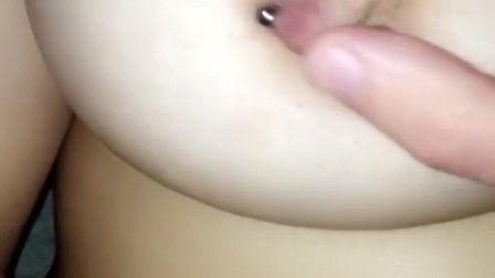 Lesbian with big tits and nipple piercings getting finger fucked