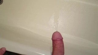 Pissing then a huge cumshot