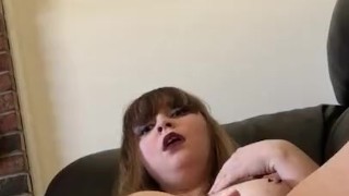 Girl fucks her pussy with the window open