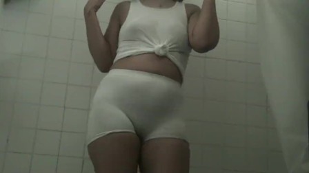 White spandex shorts and white t shirt in the shower transparent