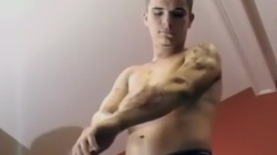 Inked straight guy solo wanking off until a warm finish