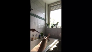 Snapchat story. Cute natural girl takes a bath by the window.