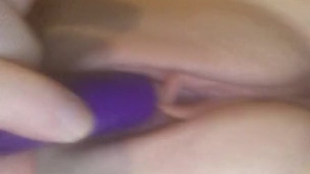 Using vibrator on shaved pussy
