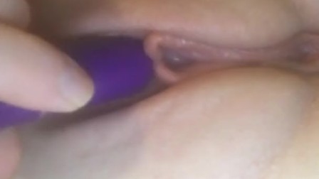 Using vibrator on shaved pussy