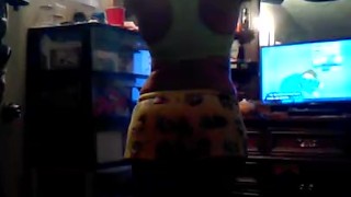Voyeur ebony thot Playing with her hair watching toons before bed