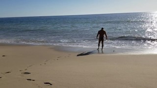 Beach walking in tiny bikini
