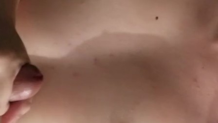 Cumming on tits from oily handjob POV