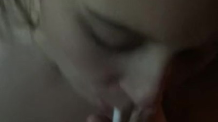Wifey smokes a nasty cig while sucking dick