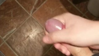 Jerking uncut cock with saliva