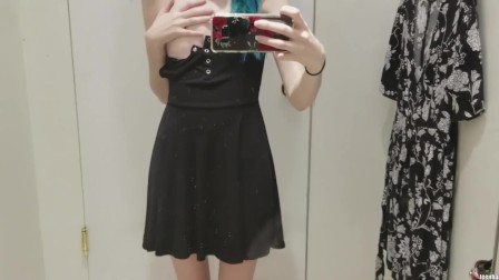 skinny gothic girl taking a selfie at hudson bay dressing room