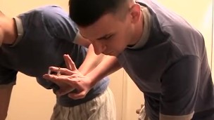 Homosexual freak pissing in the sink and  glass