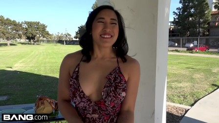Mia Li shows off her bushy pussy in some outdoor upskirt fun