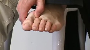 Homosexual deviant teases with his feet and sucks toes