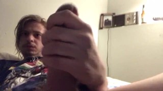 Hot Grungy dude lays in bed and strokes his big thick Cock and watches porn